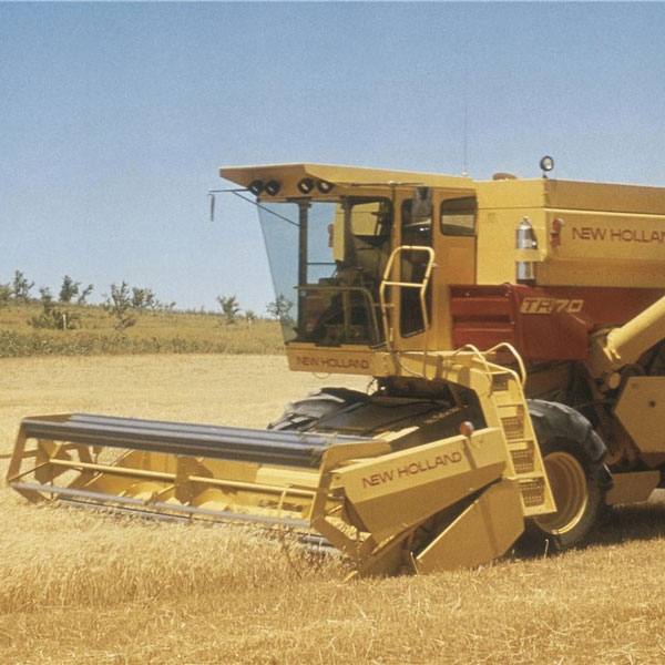first-twin-rotor-combine-new-holland-agriculture-history-1974